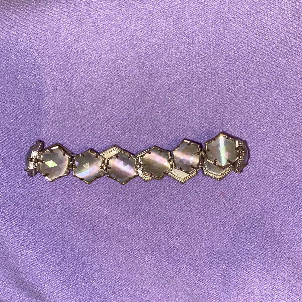 Kendra Scott silver bracelet.